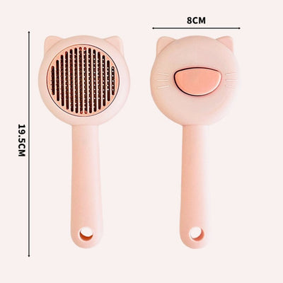 Pet grooming brush with cat design and measurements on a white background