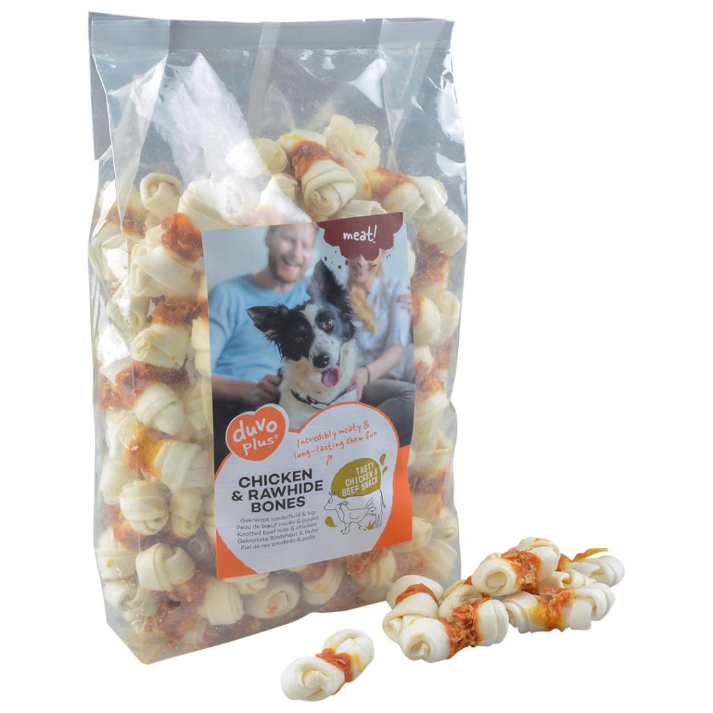 Package of duvo+ Chicken & Rawhide Bones dog treats with a man and dog on the label.