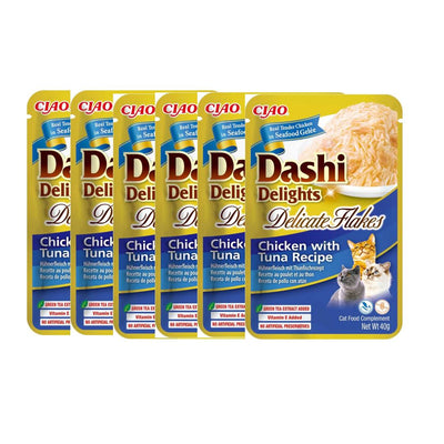 Multiple packages of Ciao Dashi Delights cat food on a white background