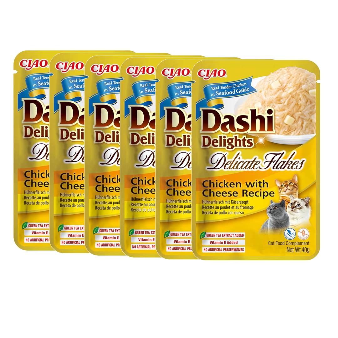 Multiple packages of Dashi Delights cat food with chicken and cheese recipe on a white background