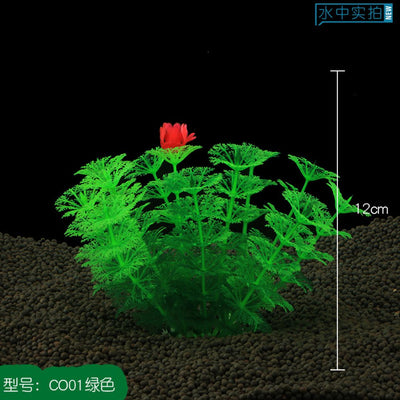 Artificial green plant with a red flower on a black background, with a measurement scale indicating 12cm.