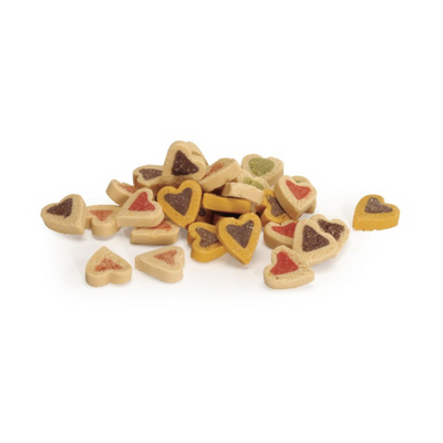 Heart-shaped cookies with various fillings on a white background