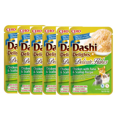 Multiple packages of Ciao Dashi Delights cat food on a white background