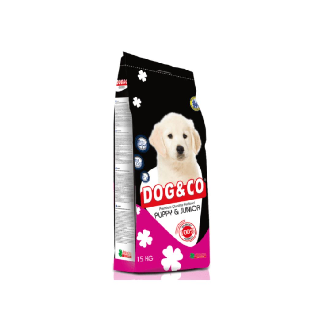 Dog & Co puppy and junior dog food packaging on a white background