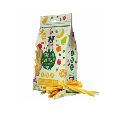 Bag of Garden Bites dog treats with colorful sticks on a white background