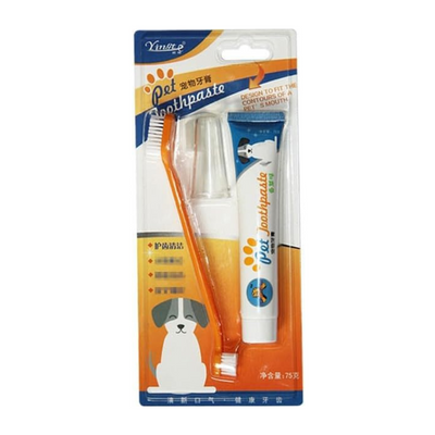 Packaging of pet toothpaste and brush set with visible branding on a white background
