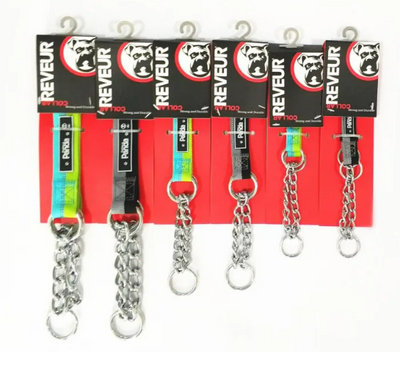 Keychains with chains on a display rack with REVEUR branding.