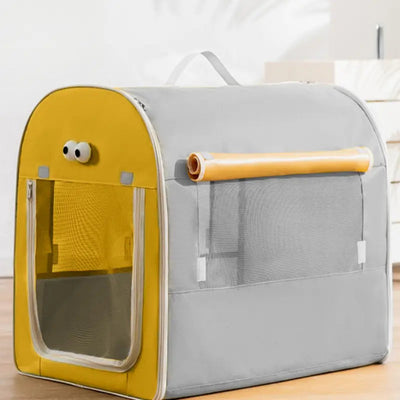 Pet carrier with yellow and gray design on a wooden floor