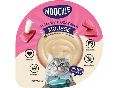 Image showing a can of Tuna Mousse with Goat Milk, a grain-free cat food made with chicken, tuna, and goat milk. The label highlights its benefits, including 100 calories per serving, omega-3 and omega-6 fatty acids for heart health, and taurine for vision and digestion support